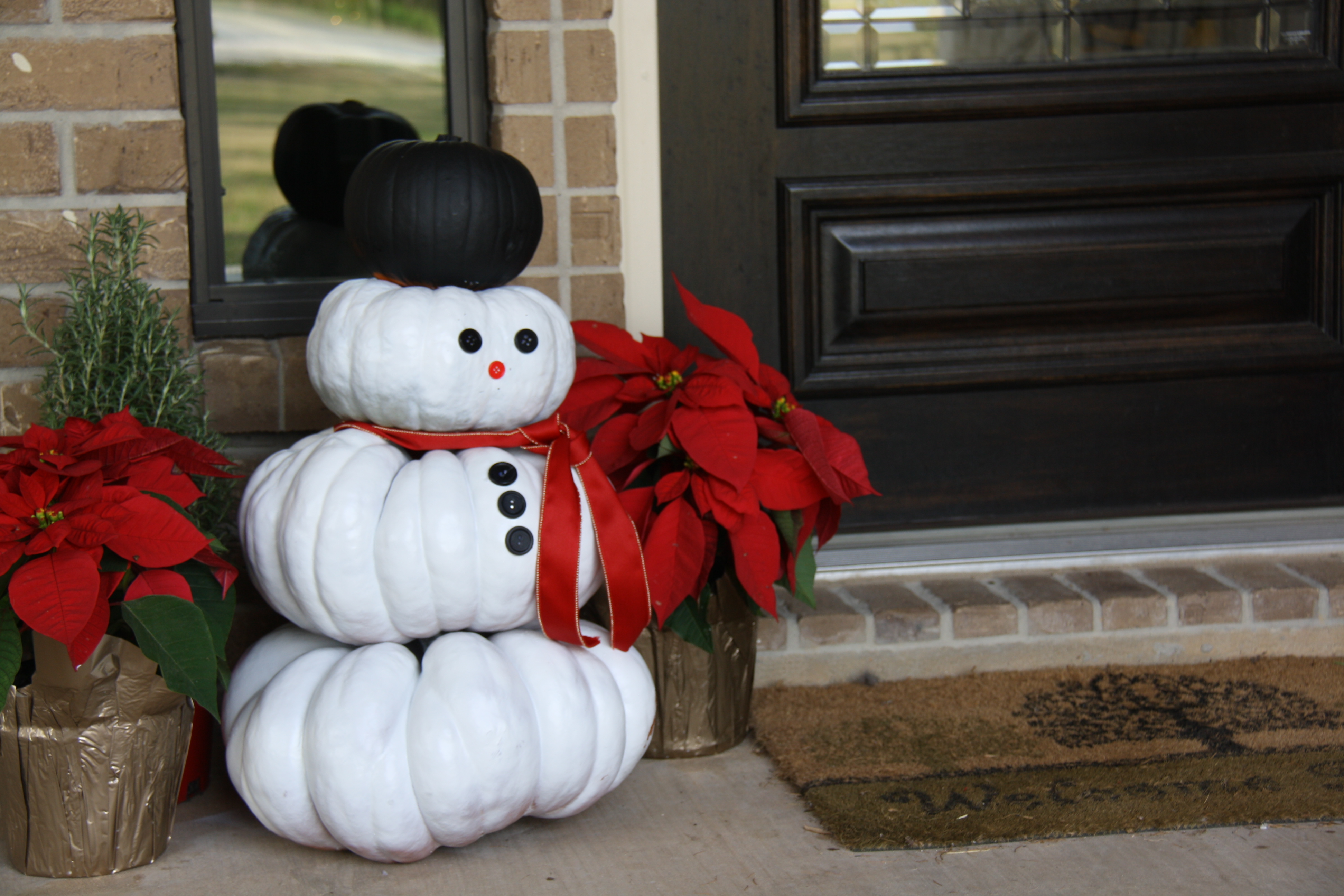 Image result for Reuse your leftover Halloween pumpkins to make snowmen.